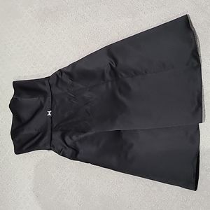 Tea-length black strapless bridesmaid dress